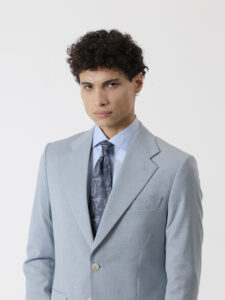 Traje celeste de dos piezas de PuroEgo con tejido de estructura, corte slim, detalle